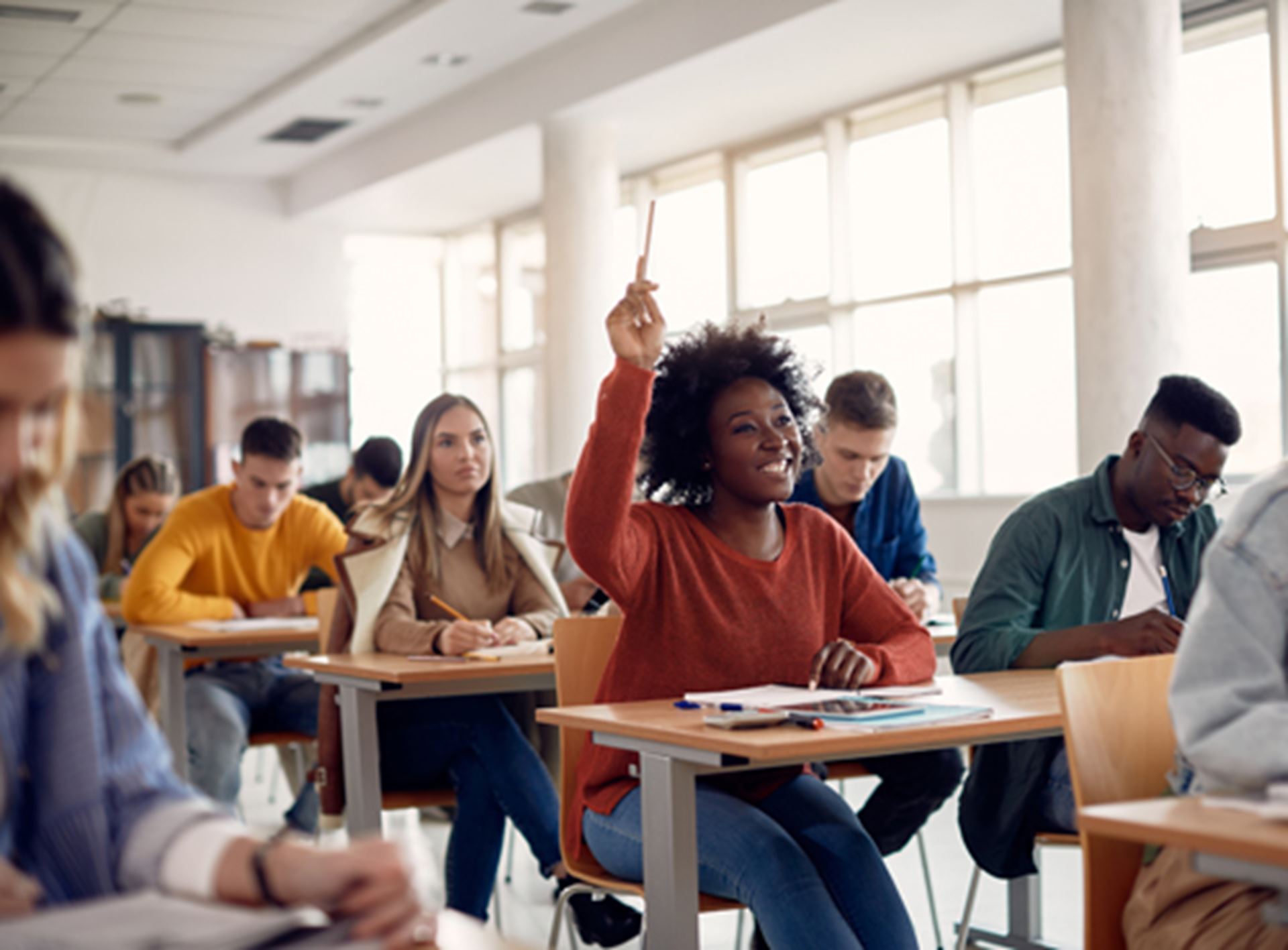 Student raising her hand