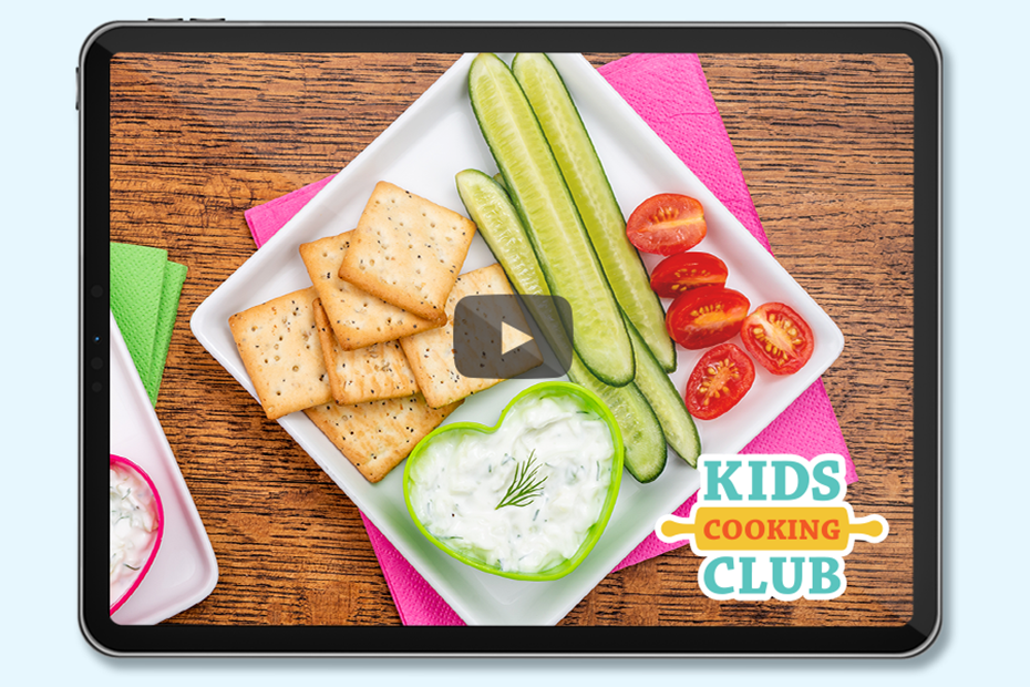 plate with crackers, cucumbers and tzatziki yogurt dip- with logo Kids Cooking Club
